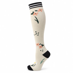 Compression Socks in cream knit with coral floral motifs, dark green botanical details, striped cuff and black heel and toe