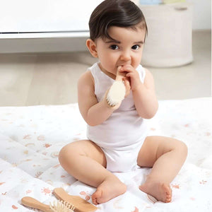 Feather & Fawn 3-piece baby grooming set with natural lotus wood brush, comb, and soft sheep wool bristles in linen storage bag