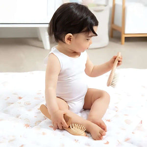 Feather & Fawn 3-piece baby grooming set with natural lotus wood brush, sheep wool bristles, and comb