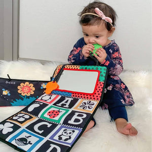 Montessori-inspired sensory tummy time mirror toy with textured cloth book and soft teethers for baby development