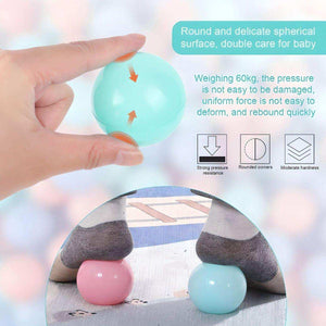 BabiePlay Colourful Odyssey Ball Pit Ball being pressed to show strong pressure resistance and safe, rounded design for babies