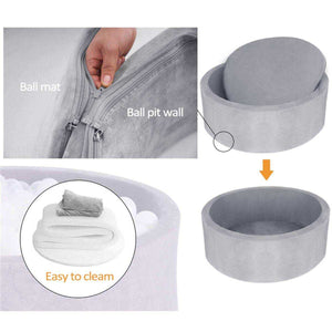 BabiePlay Ultimate Foam Ball Pit foldable grey foam baby play mat with removable cover and wall showing zipper detail for easy cleaning