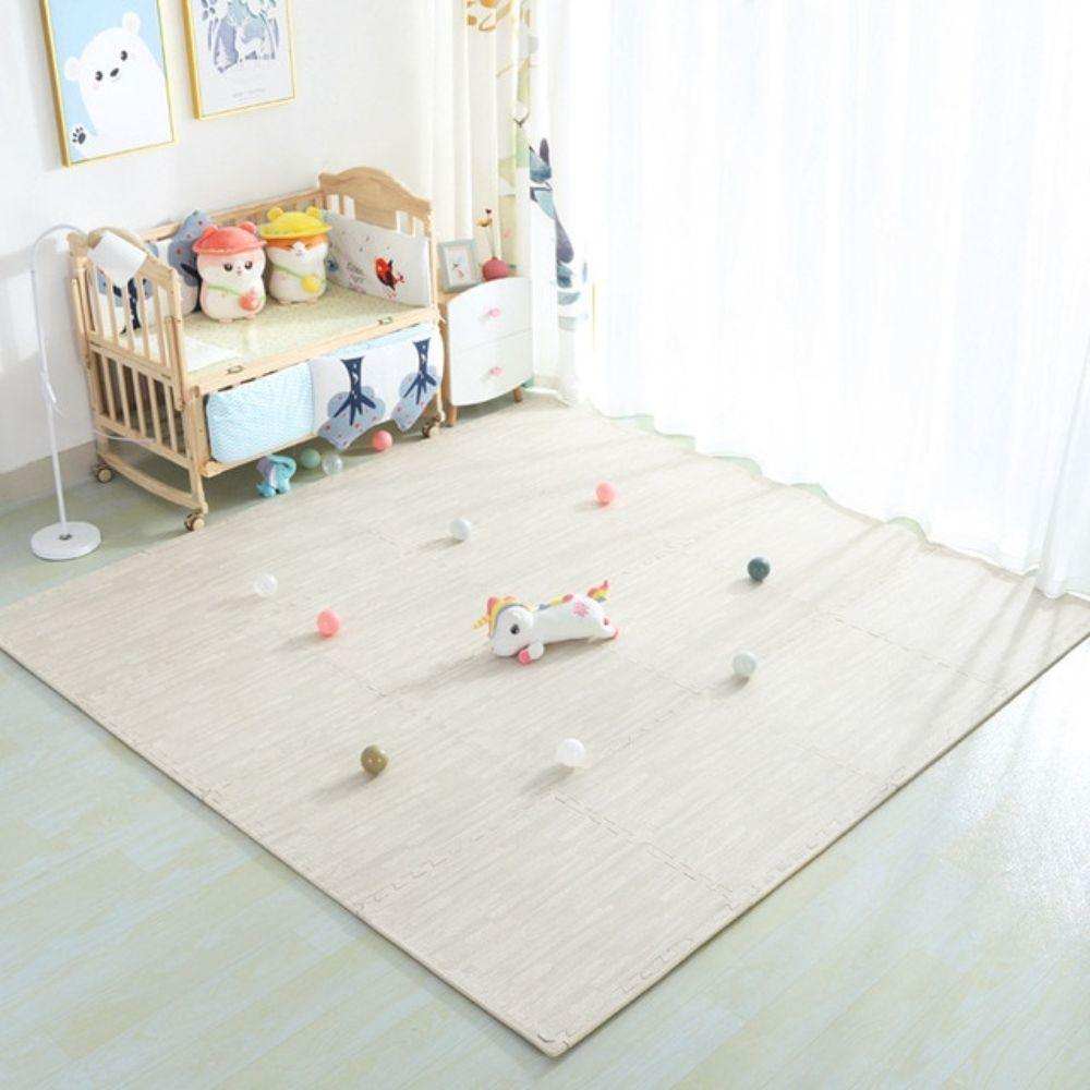 BabiePlay Wood Grain Play Mat in a bright nursery with toys and crib