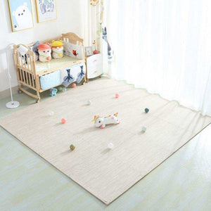 BabiePlay Wood Grain Play Mat in a bright nursery with toys and crib