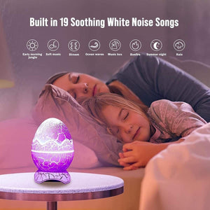 Glowly 4-in-1 Dino Egg Galaxy Projector night light with built-in white noise calming a sleeping child