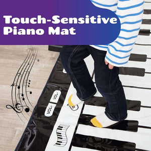 Child playing on Kidst Piano Play Mat musical keyboard dance mat with touch-sensitive keys