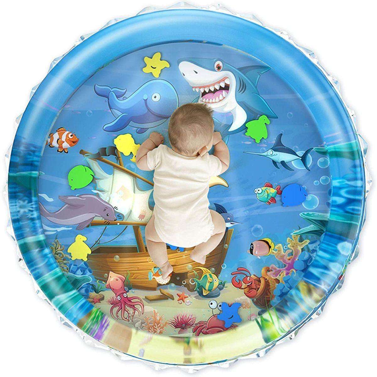 Baby playing on Toddly SplashJourney XL inflatable tummy time water mat with underwater theme.