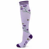 Compression Socks in light purple stretch knit with floral stems, small bees, and dark purple striped cuffs, heels and toes