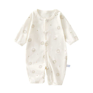 Feather & Fawn breathable baby romper with full front snaps in cream fabric
