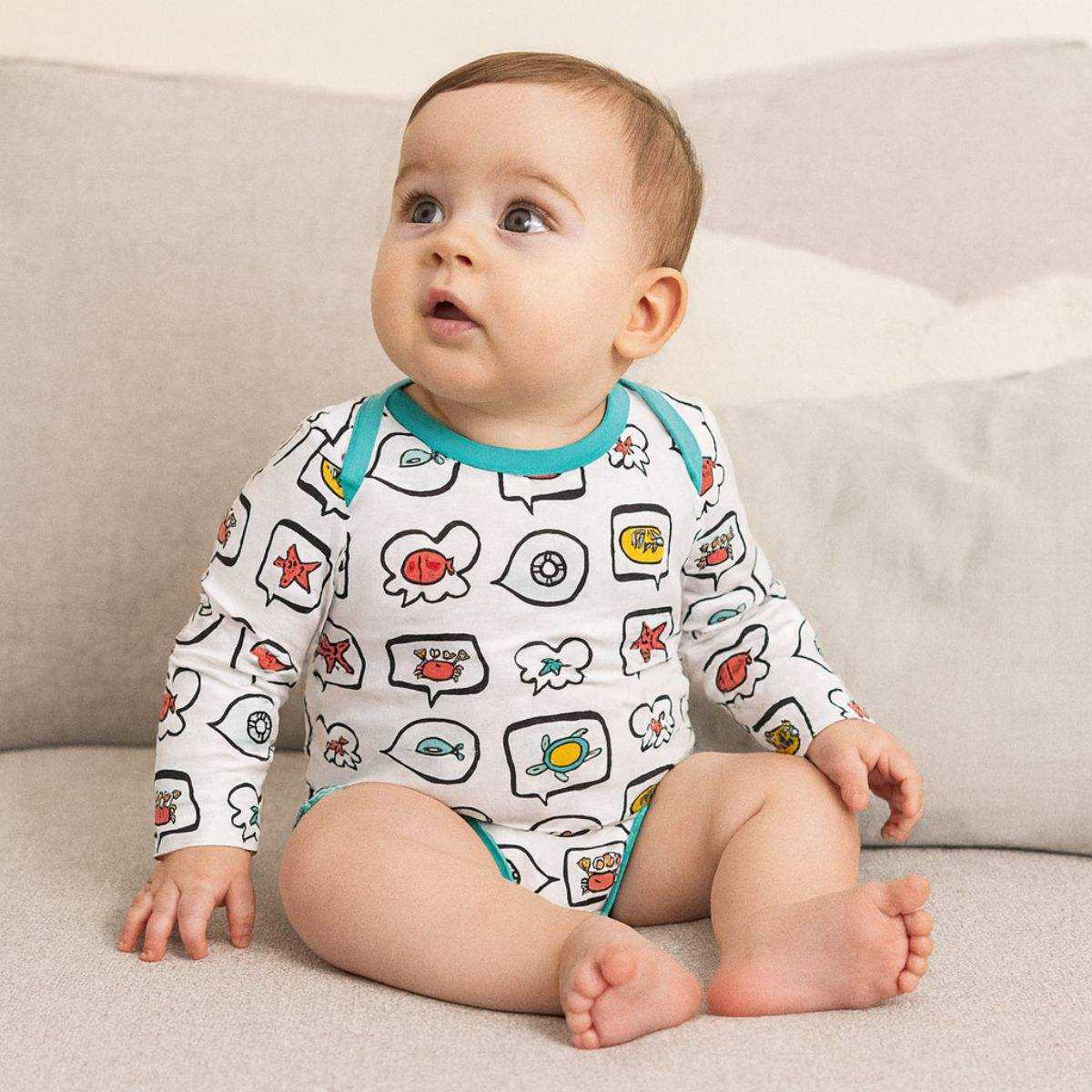 Feather & Fawn OJOS long sleeve cotton baby bodysuit with lap shoulder and crotch snaps