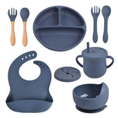 Toddly MealMate 10-piece silicone and wooden baby feeding set for baby-led weaning and self-feeding with suction bowl, plate, bib, utensils, and cups