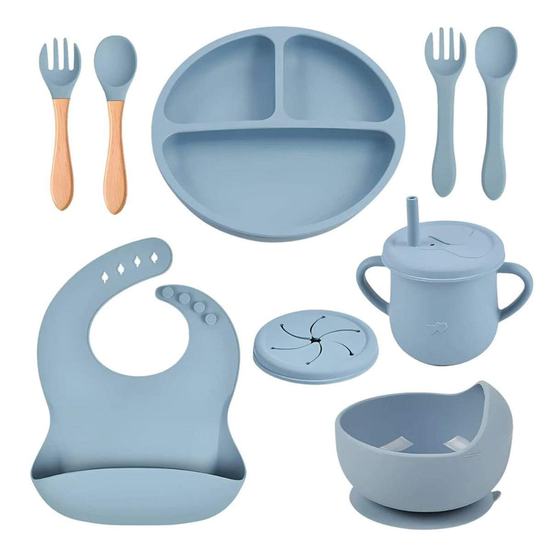 Toddly MealMate silicone feeding set with bib, suction plate, bowls, and utensils for baby-led weaning and self-feeding.